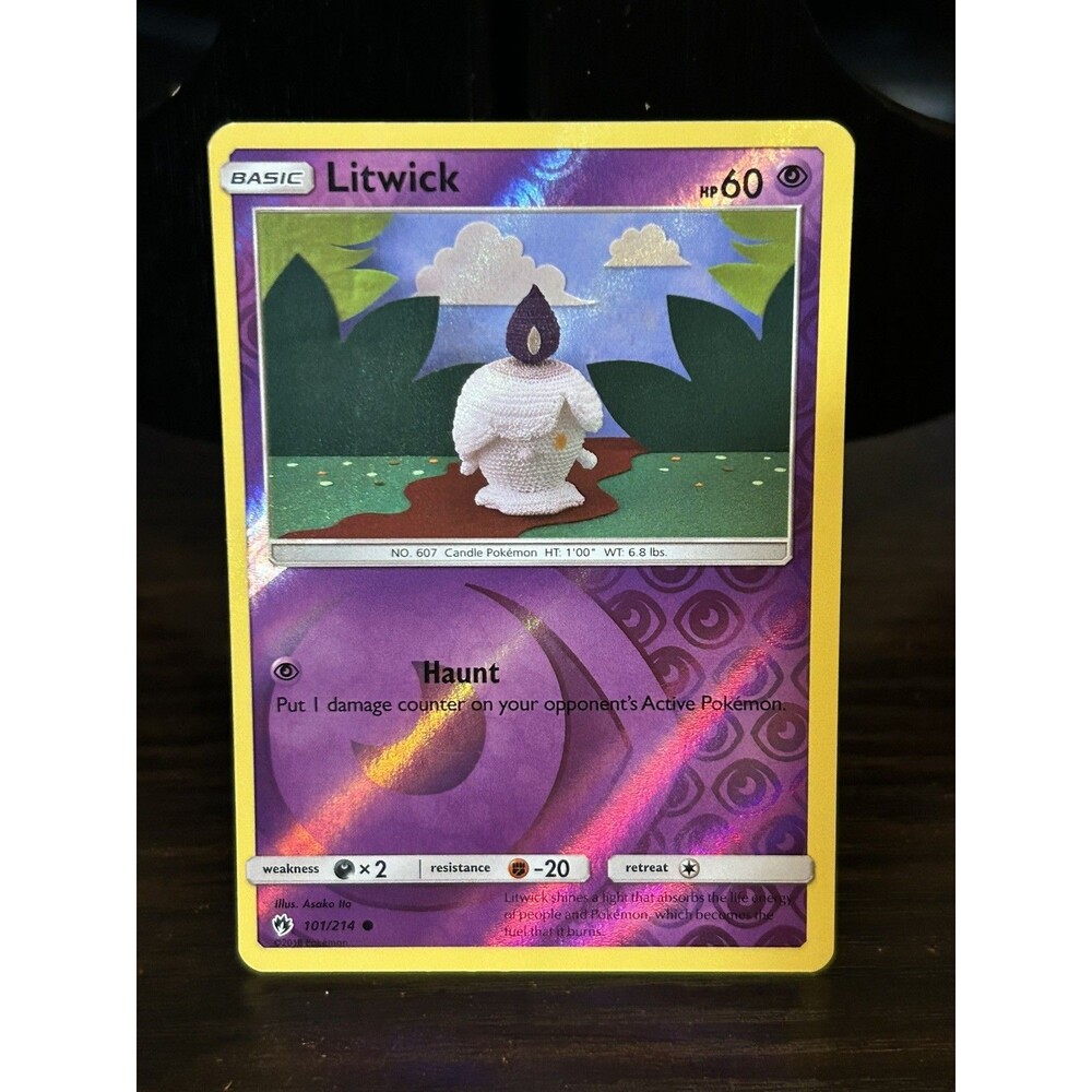 Pokemon Litwick 101/214 SM Lost Thunder Reverse Holo 2018 TCG Card LP